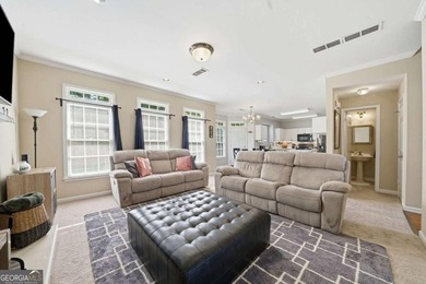 Nestled in the highly sought-after Waters Edge, this traditional - photo 14