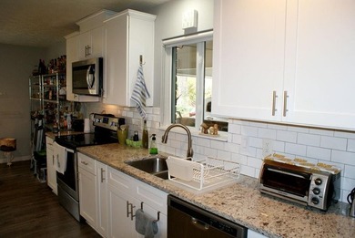 Welcome home to this beautiful, mid-century modern, 4-sided