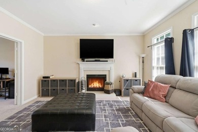 Nestled in the highly sought-after Waters Edge, this traditional - photo 16
