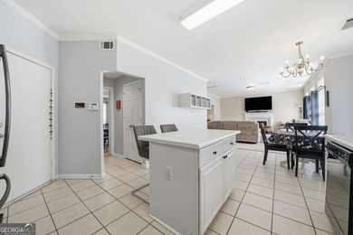 Nestled in the highly sought-after Waters Edge, this traditional - photo 20