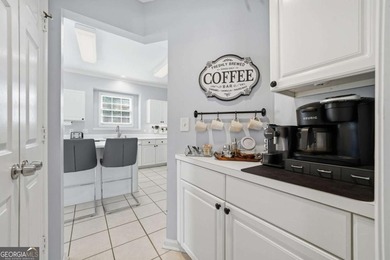 Nestled in the highly sought-after Waters Edge, this traditional - photo 21