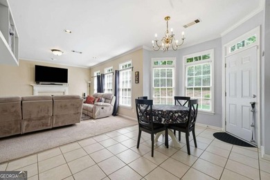 Nestled in the highly sought-after Waters Edge, this traditional - photo 22