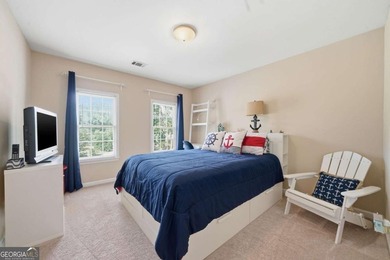Nestled in the highly sought-after Waters Edge, this traditional - photo 25
