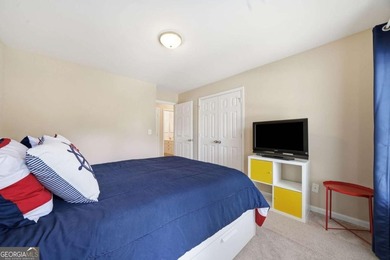 Nestled in the highly sought-after Waters Edge, this traditional - photo 26