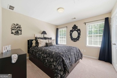 Nestled in the highly sought-after Waters Edge, this traditional - photo 28