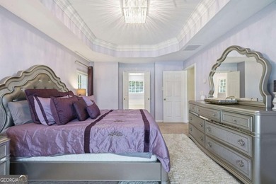 Nestled in the highly sought-after Waters Edge, this traditional - photo 30