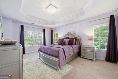 Nestled in the highly sought-after Waters Edge, this traditional - photo 31