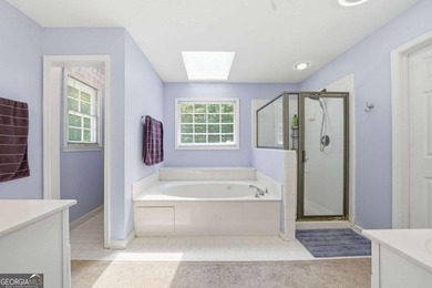 Nestled in the highly sought-after Waters Edge, this traditional - photo 33