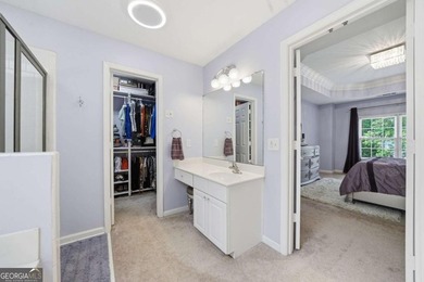 Nestled in the highly sought-after Waters Edge, this traditional - photo 34