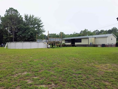 Enjoy the peace and privacy of country living in this - photo 35