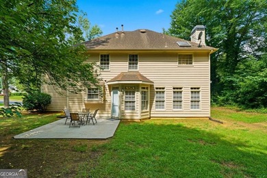 Nestled in the highly sought-after Waters Edge, this traditional - photo 37