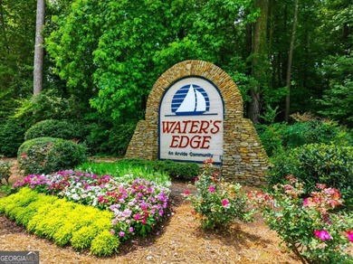 Nestled in the highly sought-after Waters Edge, this traditional - photo 41