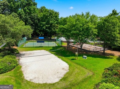 Nestled in the highly sought-after Waters Edge, this traditional - photo 46