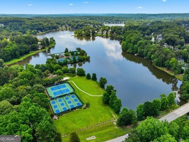 Nestled in the highly sought-after Waters Edge, this traditional - photo 47