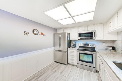 IMMACULATELY MAINTAINED & BEAUTIFULLY UPDATED 55+ CONDOMINIUM IN - photo 11