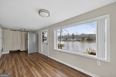 DEEDED LAKEFRONT RETREAT Welcome to an elevated lakeside - photo 12