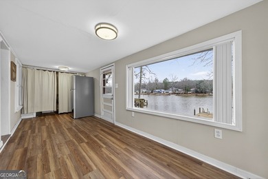DEEDED LAKEFRONT RETREAT Welcome to an elevated lakeside - photo 17