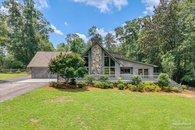 Nestled on nearly 3.5 acres in Jay, this custom-built home - photo 1