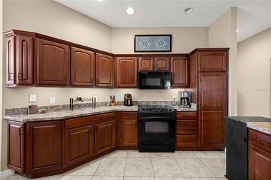 Stunning Gardenia Designer home with golf cart garage. Located - photo 15
