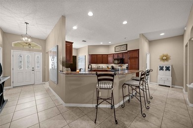 Stunning Gardenia Designer home with golf cart garage. Located - photo 17