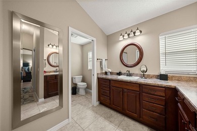 Stunning Gardenia Designer home with golf cart garage. Located - photo 25