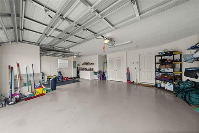 Stunning Gardenia Designer home with golf cart garage. Located - photo 32