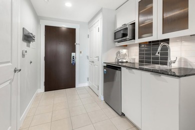 Second-floor bayfront condo with elevated positioning that - photo 29