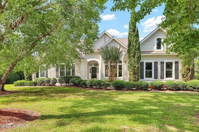 Charming traditional home on half-acre corner lot in the highly - photo 1