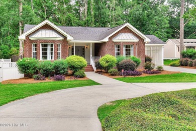 **This stunning brick home truly has it all.** Nestled in one of - photo 2