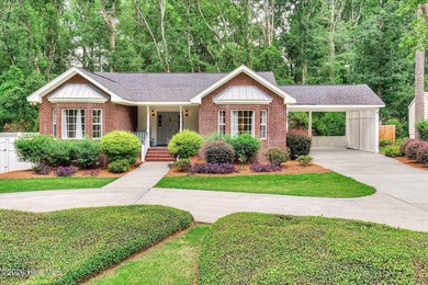 **This stunning brick home truly has it all.** Nestled in one of - photo 3