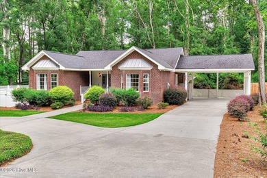 **This stunning brick home truly has it all.** Nestled in one of - photo 4
