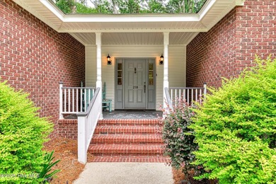 **This stunning brick home truly has it all.** Nestled in one of - photo 5