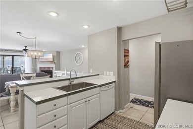 Welcome to your two-level lakefront retreat in the heart of the - photo 12