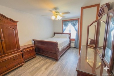 Well maintained 2 family home featuring a 2 bedroom apt with 1.5 - photo 13