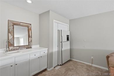 Welcome to your two-level lakefront retreat in the heart of the - photo 21