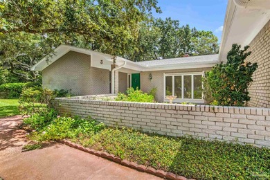 This 3/2.5 brick exterior with a split plan has numerous - photo 1