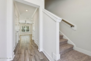 AVAILABLE NOW! This charming three-bedroom - photo 10