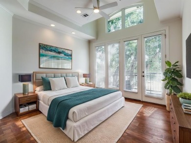 No HOA for this elegant corner townhome with tall ceilings and