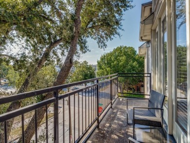 No HOA for this elegant corner townhome with tall ceilings and