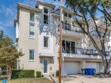 No HOA for this elegant corner townhome with tall ceilings and