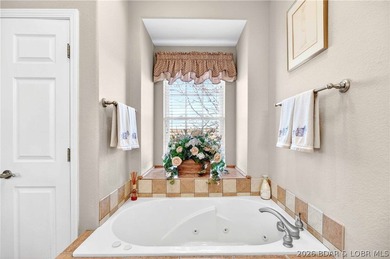 6835 Saint Tropez Circle in Osage Beach offers inviting Lake of - photo 29