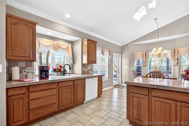 6835 Saint Tropez Circle in Osage Beach offers inviting Lake of - photo 33