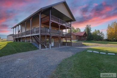 THIS HOME IS IN A HENRYS LAKE COMMUNITY WITH MARINA FOR USE BY - photo 1