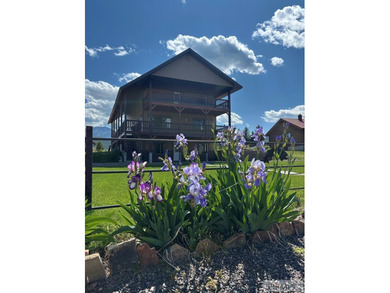 THIS HOME IS IN A HENRYS LAKE COMMUNITY WITH MARINA FOR USE BY - photo 2