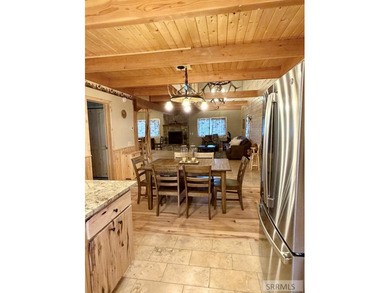 THIS HOME IS IN A HENRYS LAKE COMMUNITY WITH MARINA FOR USE BY - photo 4
