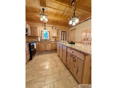 THIS HOME IS IN A HENRYS LAKE COMMUNITY WITH MARINA FOR USE BY - photo 5
