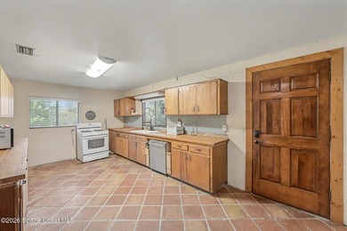 Set on 4.62 acres along a paved road, this 3BR/2BA country home - photo 12