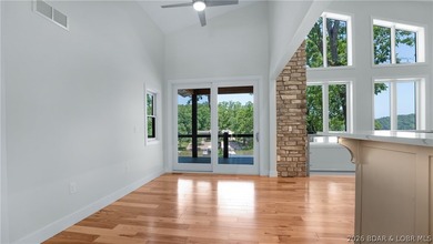 Experience Open Space Luxury lakefront living in this custom - photo 19