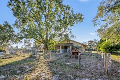 Set on 4.62 acres along a paved road, this 3BR/2BA country home - photo 24