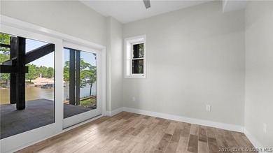 Experience Open Space Luxury lakefront living in this custom - photo 25
